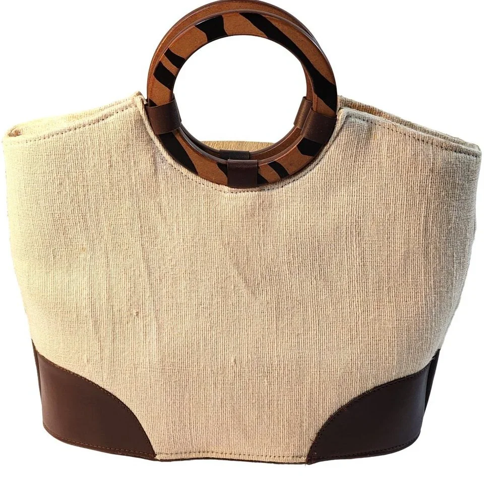 Beige Woven Handbag With Brown Accent at Bottom and Brown Decorative Wood handle